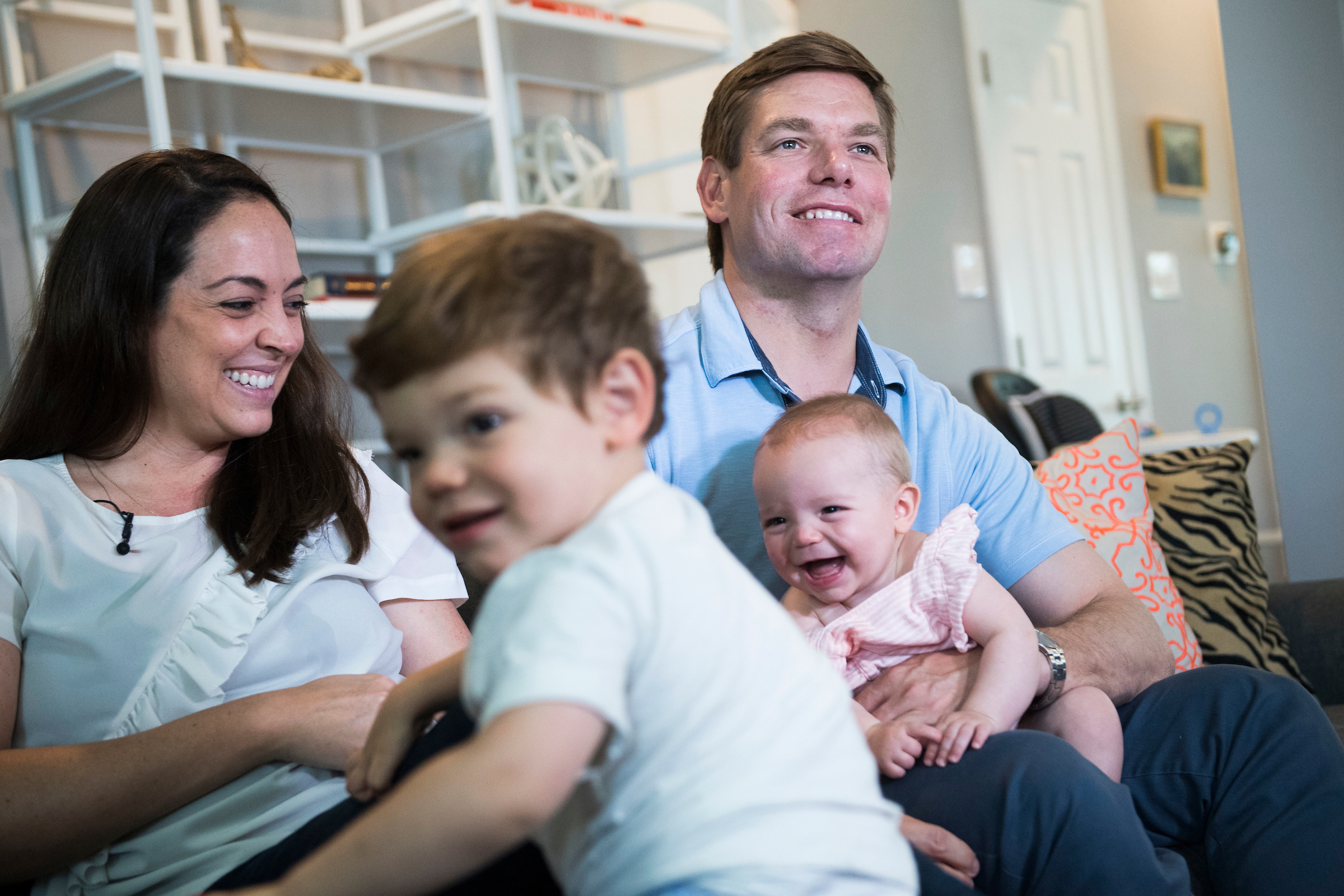 Rep. Eric Swalwell, D-Calif., his wife, Brittany, their son, Nelson, 2, and daughter, Cricket, 7 months, in a May interview. (Tom Williams/CQ Roll Call file photo)