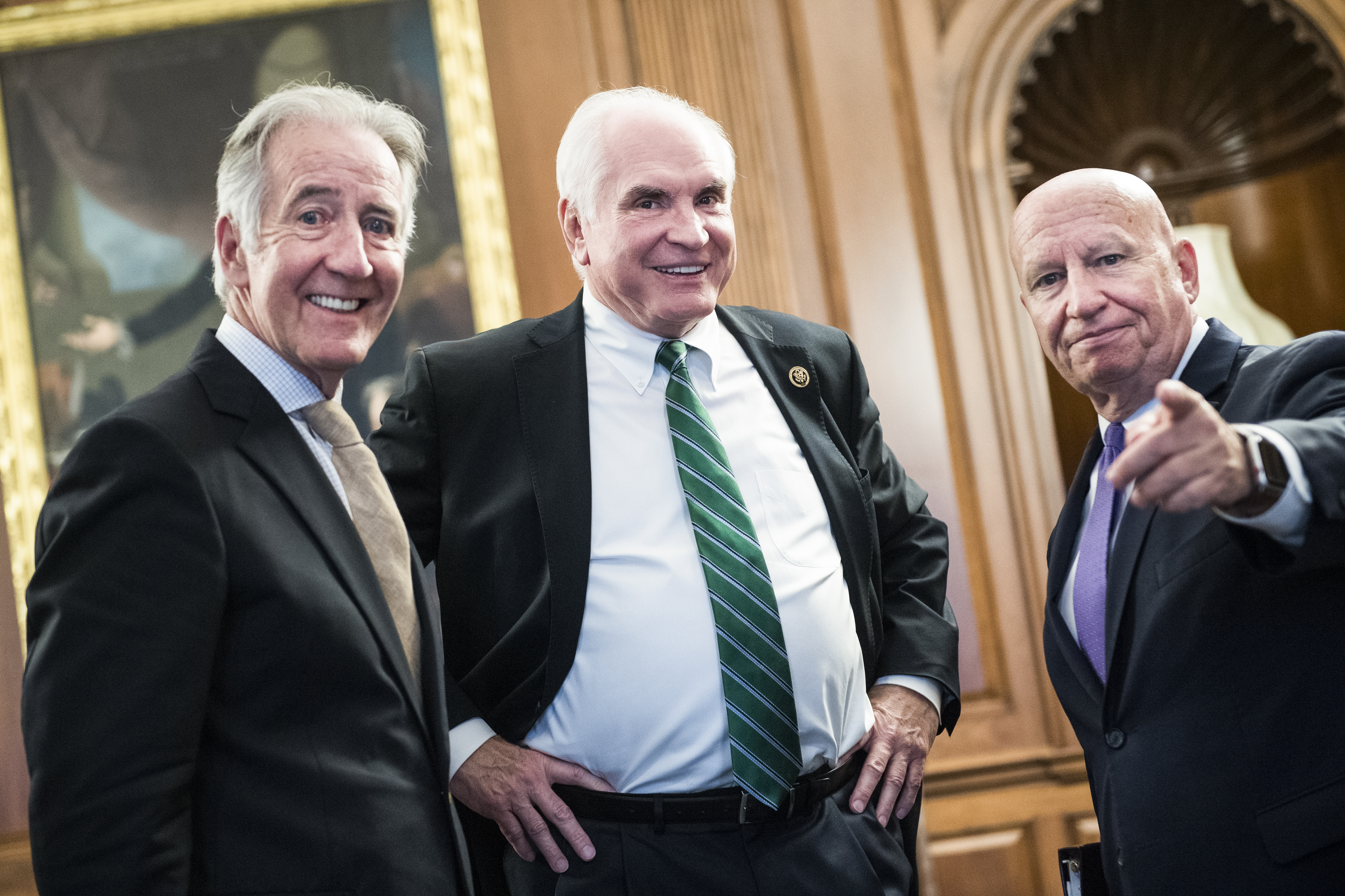 UNITED STATES - JUNE 21: From left, Ways and Means Chairman Richard Neal, D-Mass., Rep. Mike Kelly, R-Pa., and ranking member Kevin Brady, R-Texas, are seen in the Capitol's Rayburn Room before a bill enrollment for the Taxpayer First Act on Friday, June 21, 2019. (Photo By Tom Williams/CQ Roll Call)