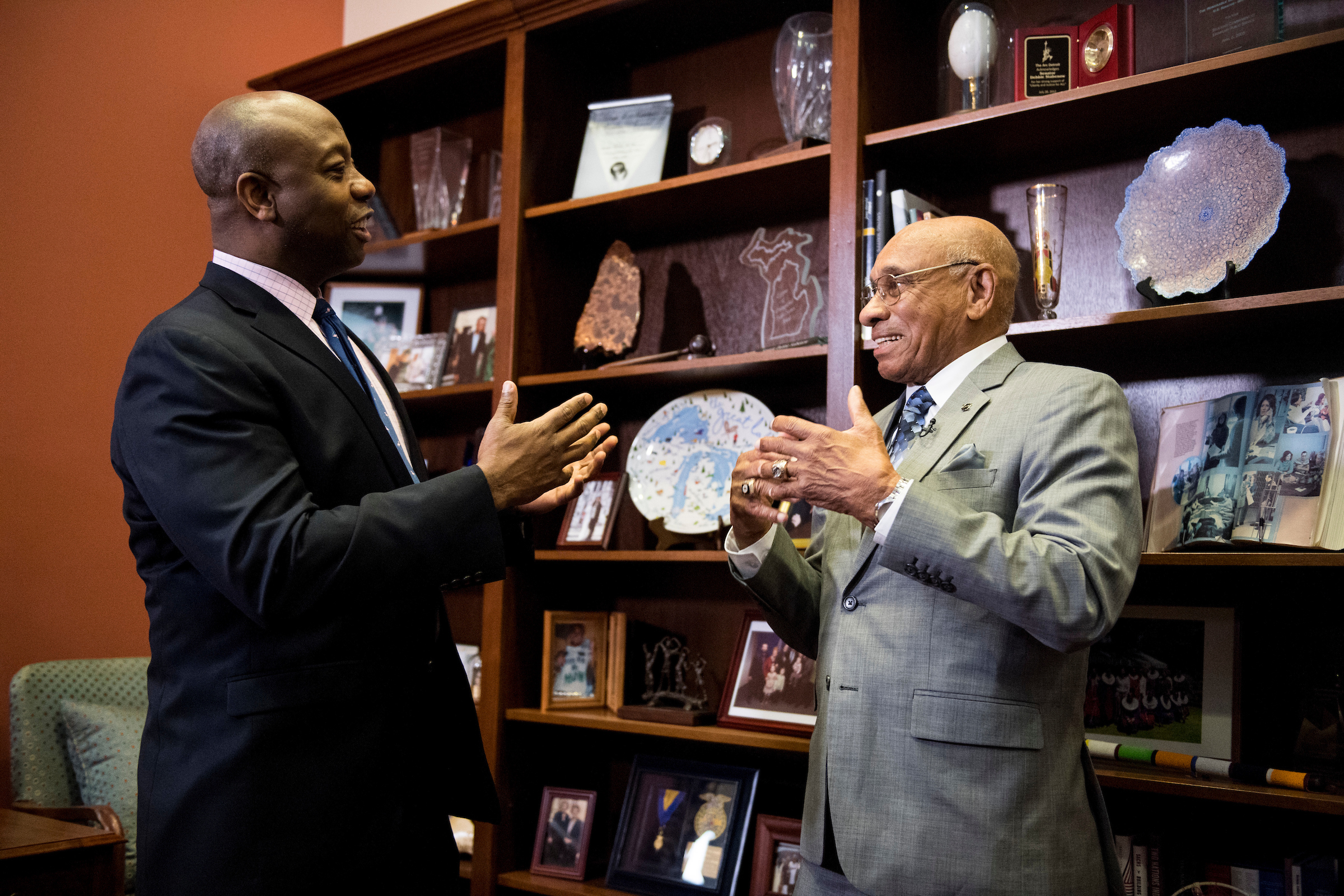 Sen. Tim Scott meets with Willie O’Ree, the first black player to compete in the National Hockey League, in Sen. Debbie Stabenow’s office on Thursday. Stabenow, who was running late, and Scott announced their bipartisan legislation to award the Congressional Gold Medal to O’Ree. (Bill Clark/CQ Roll Call)