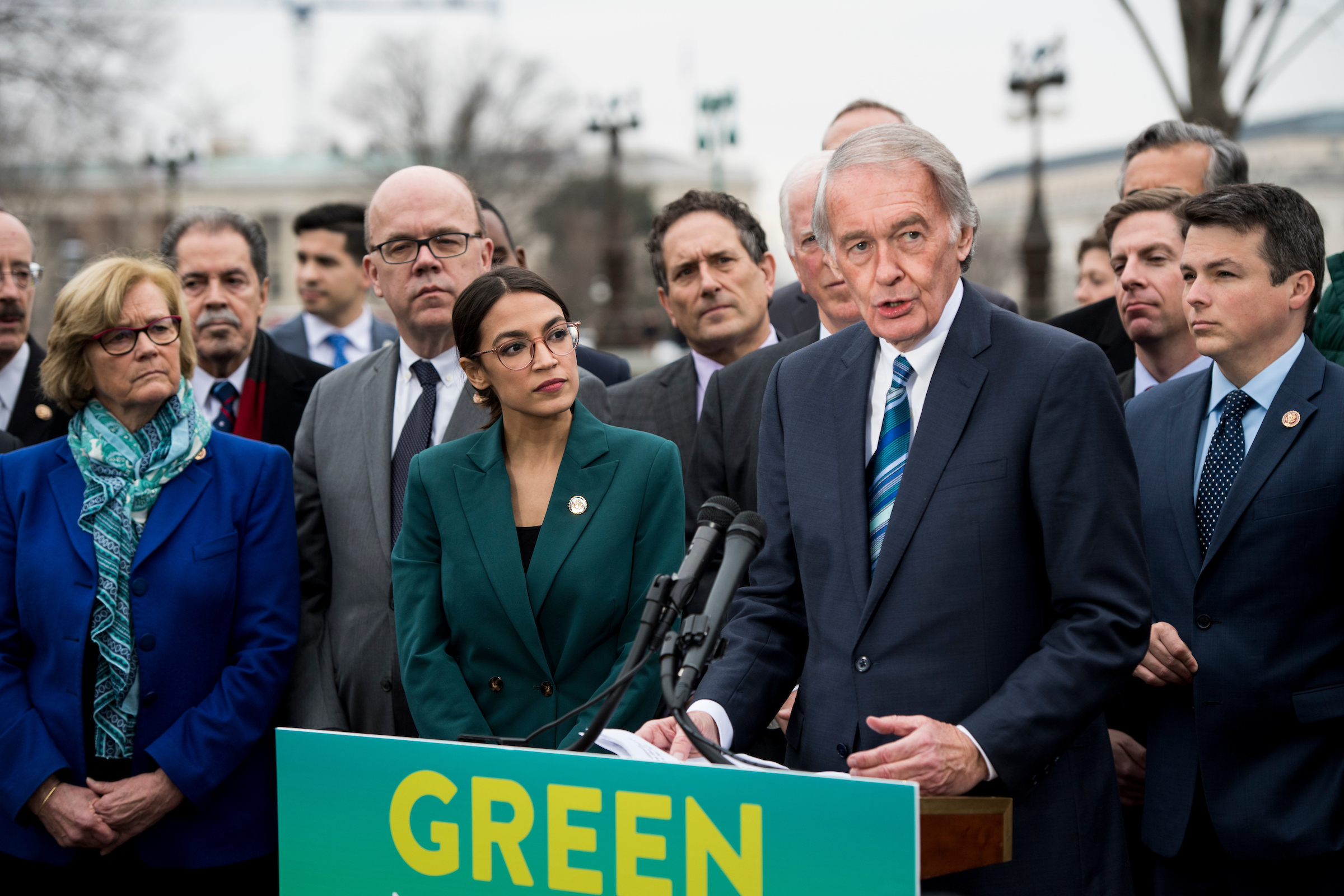 Democrats, led by Sen. Edward J. Markey and Rep. Alexandria Ocasio-Cortez, center, introduce the Green New Deal in February. The resolution still hasn’t received a committee vote and hasn’t resulted in legislation. (Bill Clark/CQ Roll Call file photo)