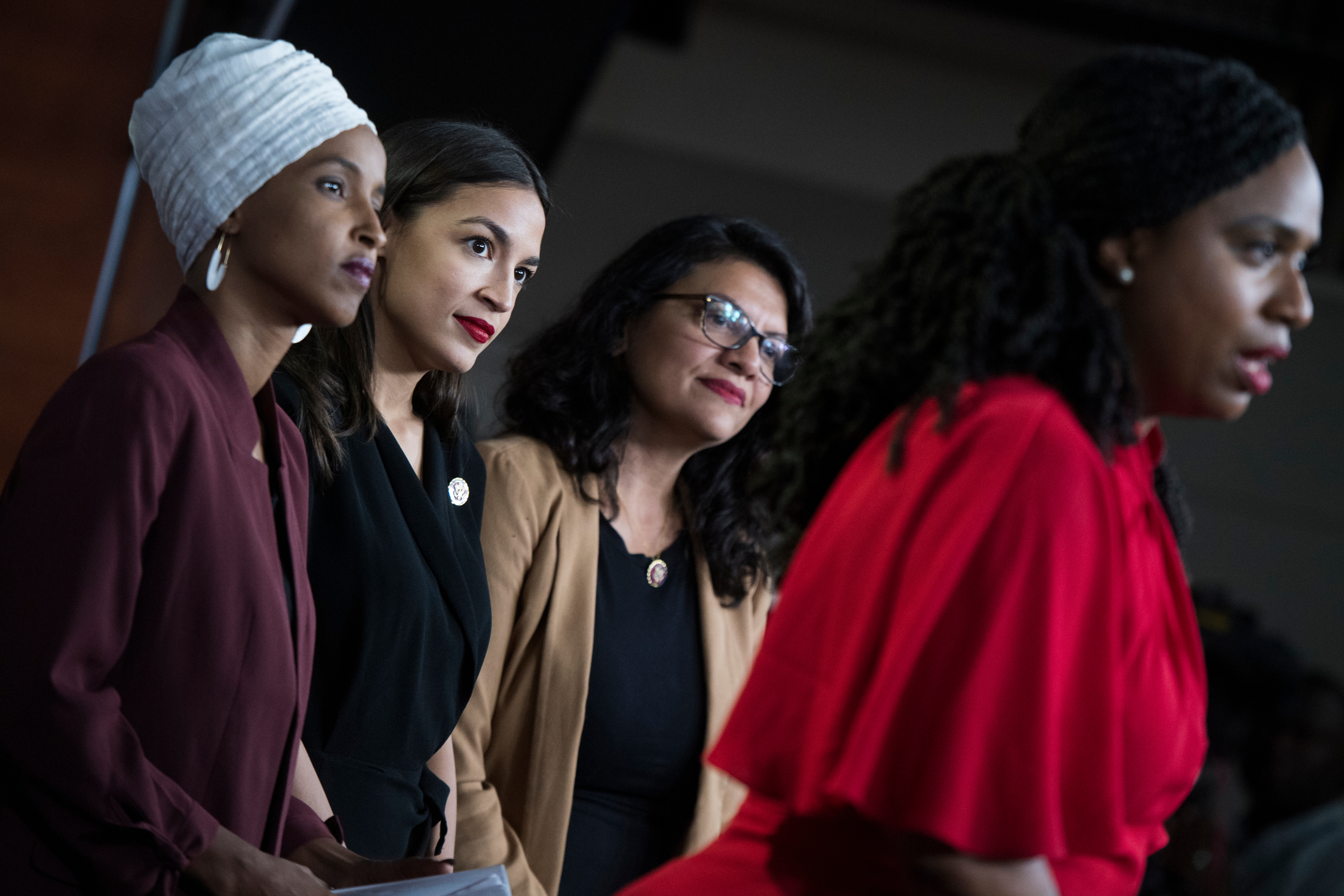 UNITED STATES - JULY 15: From left, Reps. Ilhan Omar, D-Minn., Alexandria Ocasio-Cortez, D-N.Y., Rashida Tlaib, D-Mich., and Ayanna Pressley, D-Mass., conduct a news conference in the Capitol Visitor Center responding to negative comments by President Trump that were directed at the freshmen House Democrats on Monday, July 15, 2019. (Photo By Tom Williams/CQ Roll Call)