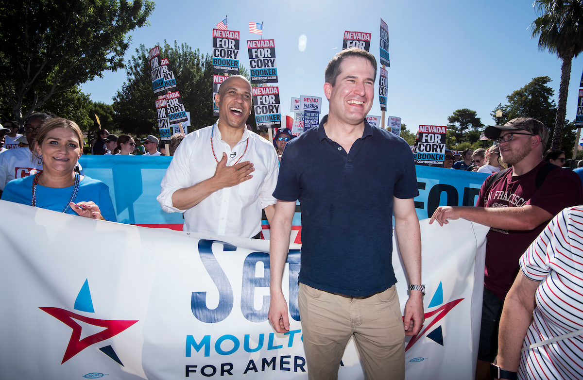 UNITED STATES - JULY 4: Presidential candidate Sen. Cory Booker, D-N.J., speaks with fellow candidate Rep. Seth Moulton, D-Mass., before the start of the Boulder City Damboree Celebration 4th of July parade in Boulder City, NV on July 4, 2019. (Photo By Bill Clark/CQ Roll Call)