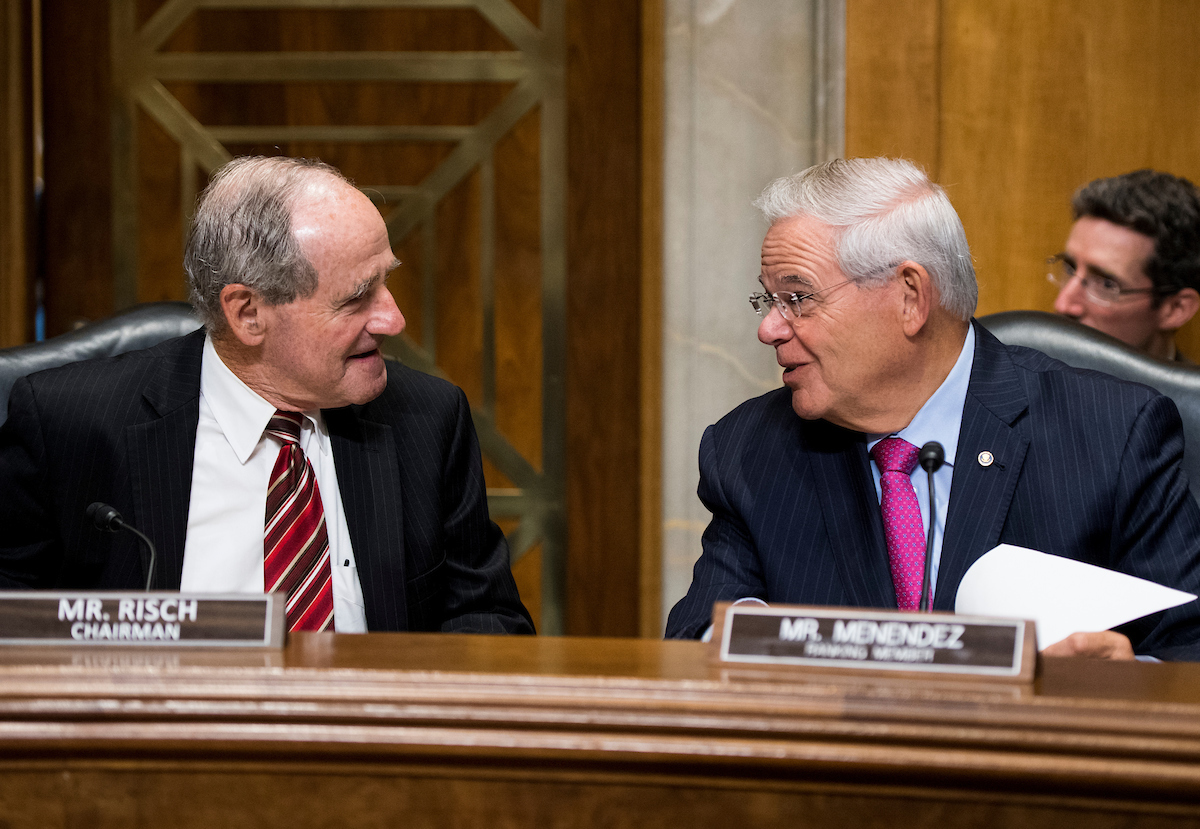 Senate Foreign Relations Chairman Sen. Jim Risch, R-Idaho, left, and ranking member Sen. Robert Menendez, D-N.J., look to reconcile differences over congressional authorization for the use of military force. (File photo by Bill Clark/CQ Roll Call)