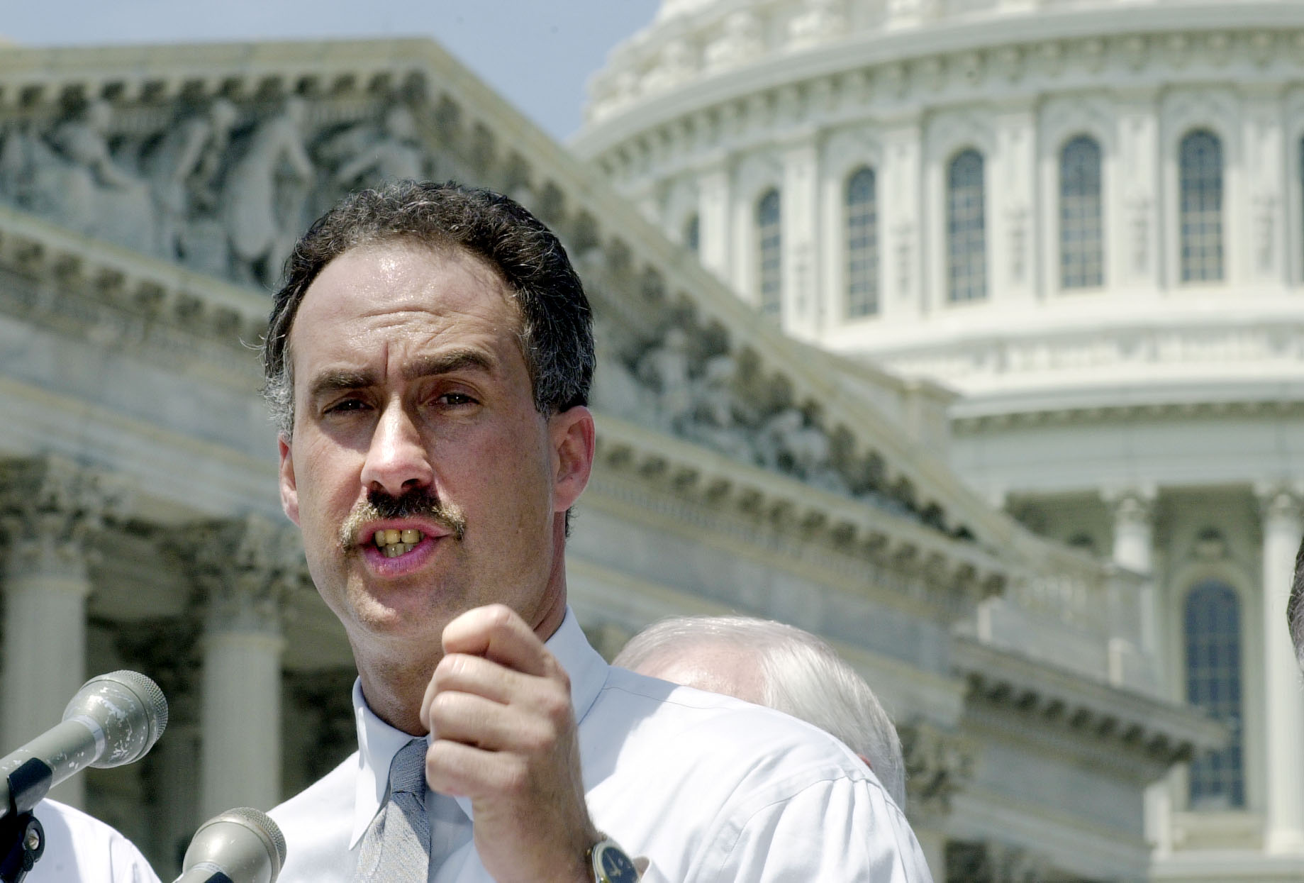New York Rep. John E. Sweeney talks to reporters at a news conference on Capitol Hill in 2001. The former congressman is battling cancer. (Jeff Wolfram/CQ Roll Call file photo)