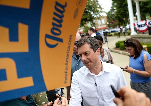 Democratic presidential candidate and South Bend, Indiana, mayor Pete Buttigieg talks with attendees at a campaign event in Fairfield, Iowa, on Thursday. (Caroline Brehman/CQ Roll Call)