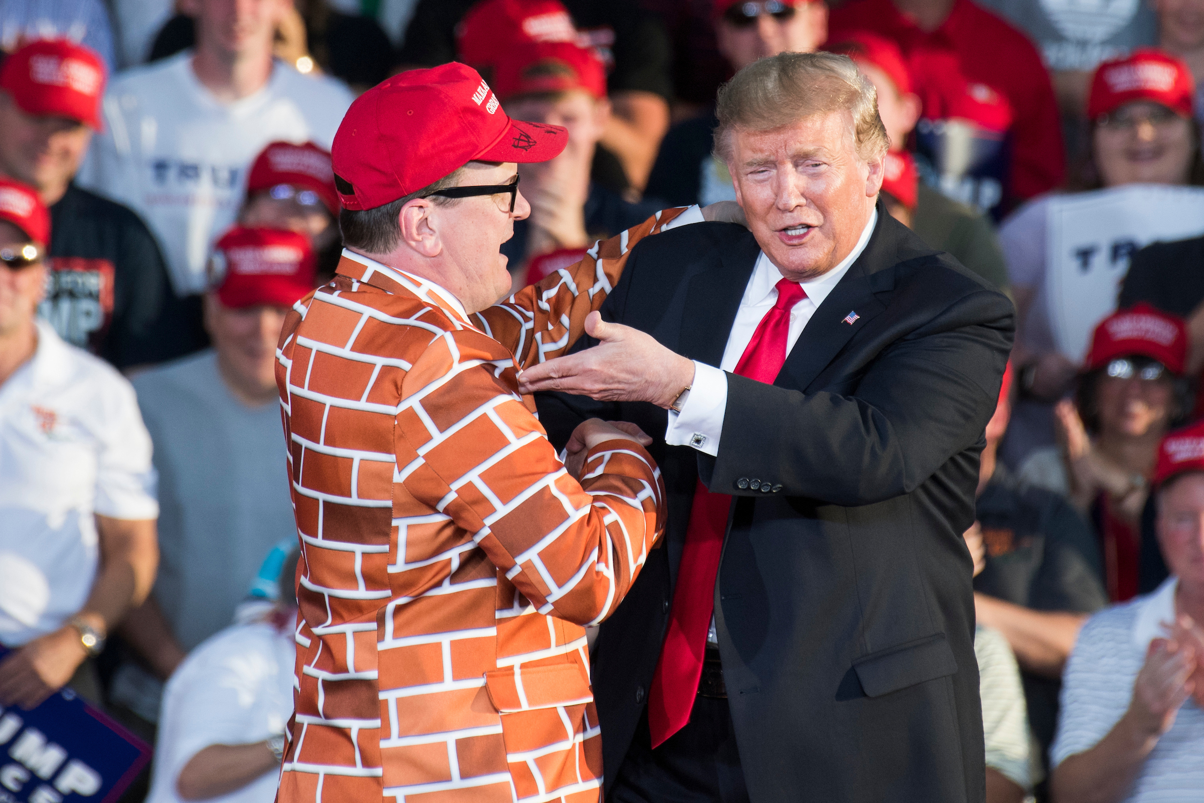 President Donald Trump greets Blake Marnell of San Diego, during a rally at the Williamsport Regional Airport in Montoursville, Pa., on May 20. He spoke to reporters Monday as he left the White House for another rally, this one in North Carolina. (Tom Williams/CQ Roll Call file photo)