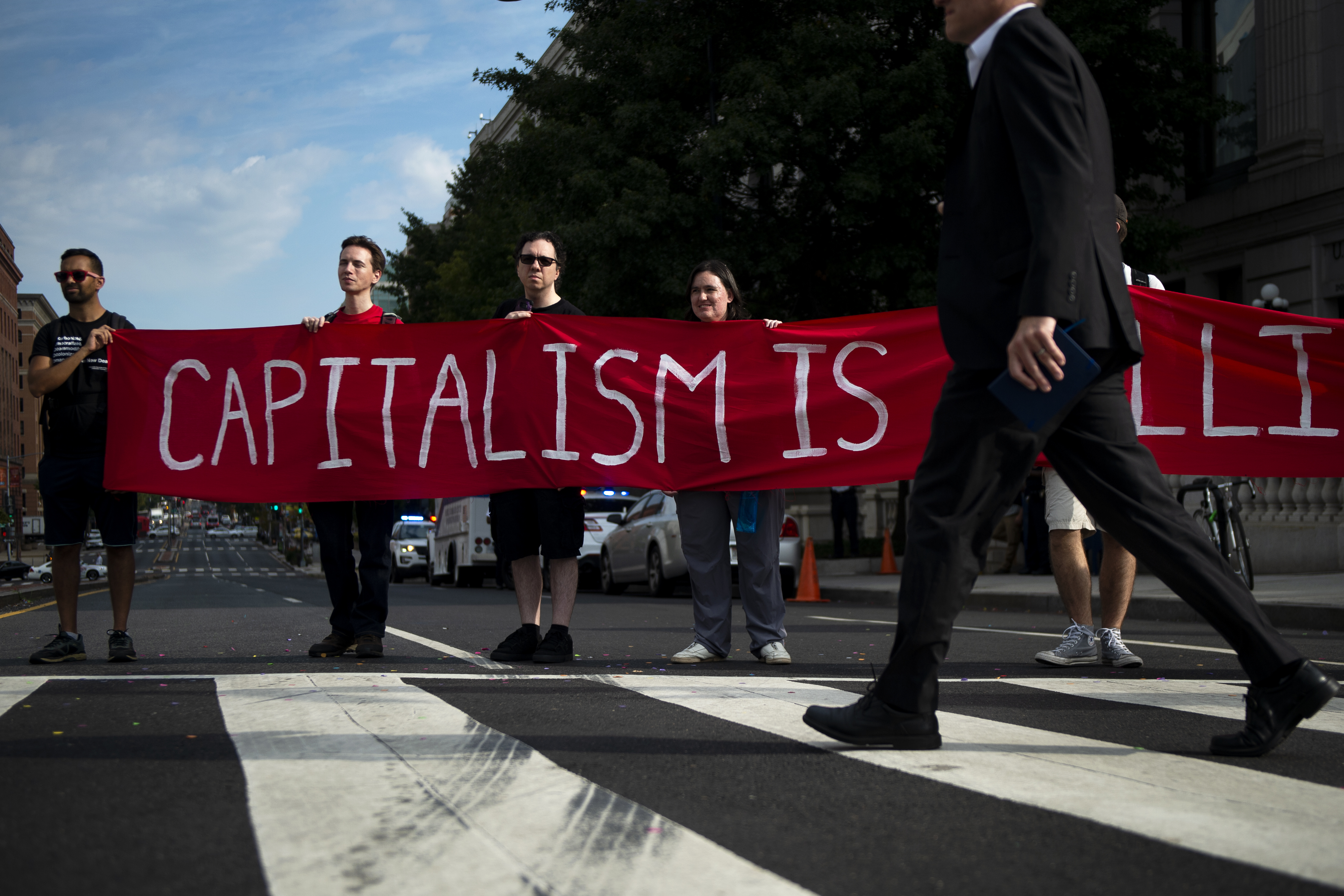 UNITED STATES - SEPTEMBER 23: Climate change protesters block morning traffic near the U.S. Capitol at rush hour on Monday, Sept. 23, 2019. A coalition of climate activists under the umbrella “Shut Down D.C.” blocked intersections throughout DC to draw attention to climate change. (Photo by Caroline Brehman/CQ Roll Call)
