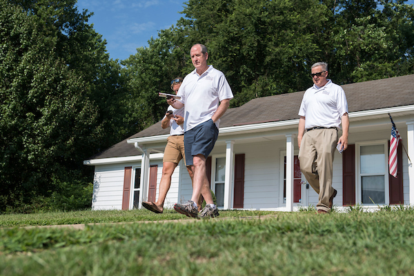 UNITED STATES - AUGUST 10: Dan Bishop, center, Republican candidate for North Carolina's 9th District, Michael Whatley, right, chairman of the N.C. Republican Party, and David Buzzard, canvas a neighborhood in Parkton, N.C., on Saturday, August 10, 2019. (Photo By Tom Williams/CQ Roll Call)