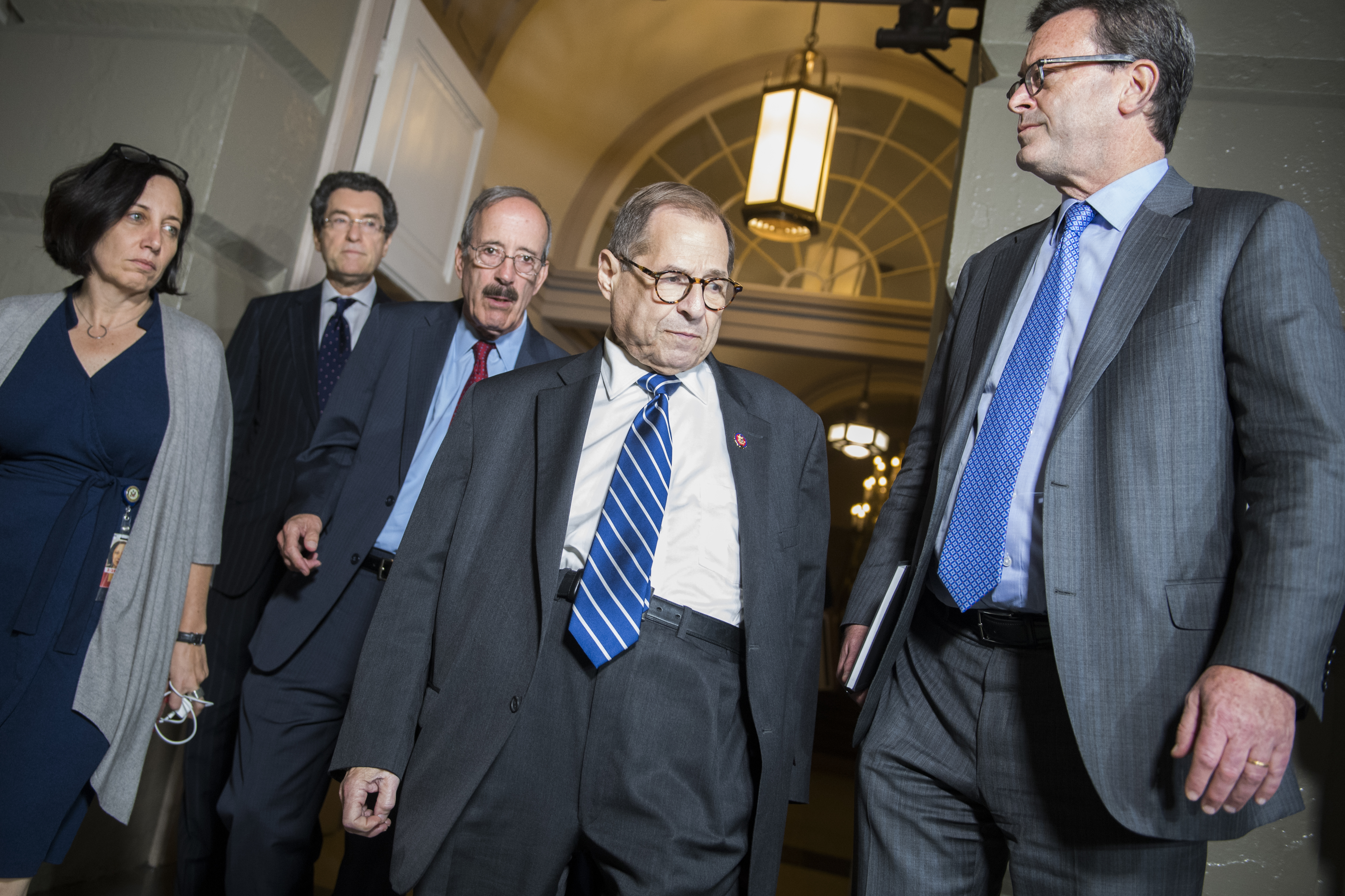 UNITED STATES - SEPTEMBER 24: House Judiciary Chairman Jerrold Nadler, D-N.Y., and Foreign Affairs Chairman Eliot Engel, D-N.Y., arrive for a meeting with the House Democratic Caucus about an impeachment inquiry of President Trump in the Capitol on Tuesday, September 24, 2019. Committee counsels Norm Eisen, second from left, and Barry Berke, right, also appear. (Photo By Tom William/CQ Roll Call)