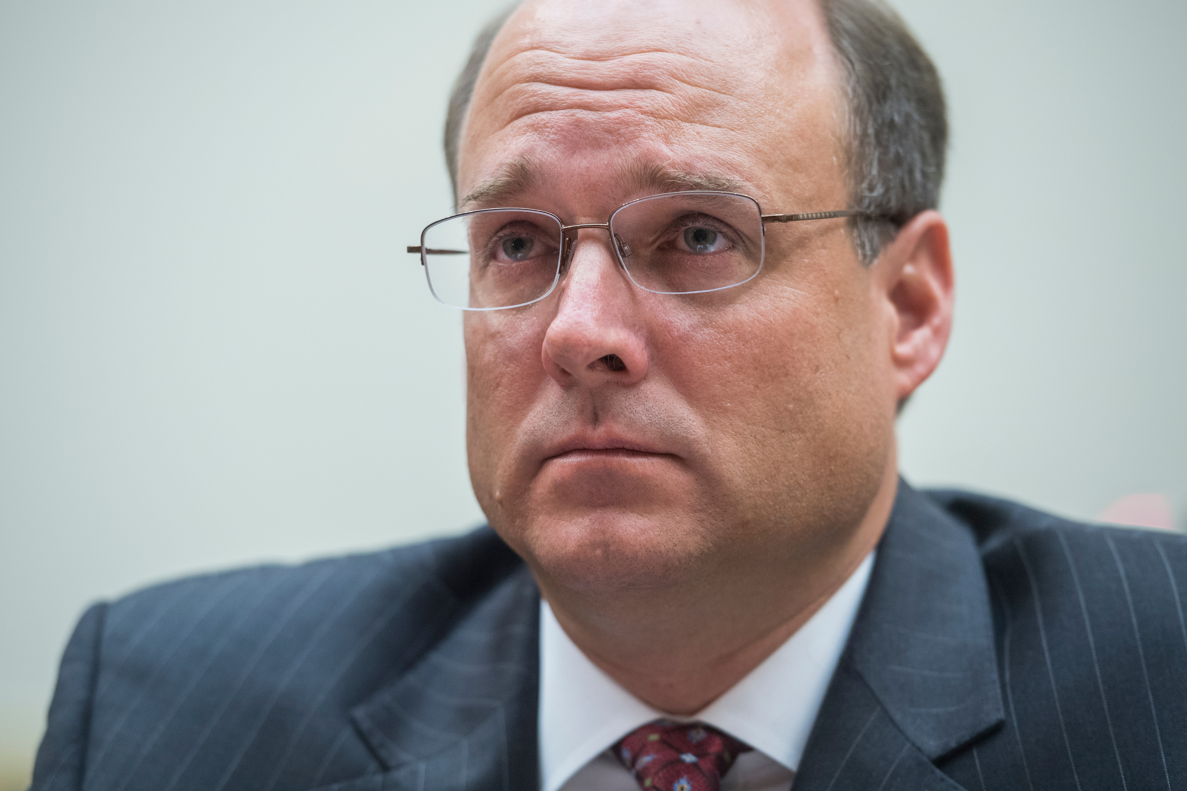 Marshall Billingslea prepares to testify during a House Foreign Affairs Committee hearing in 2017.  Billingslea’s nomination is in doubt because lawmakers say the Trump administration has not turned over information relating to Billingslea’s background. (Tom Williams/CQ Roll Call file photo)