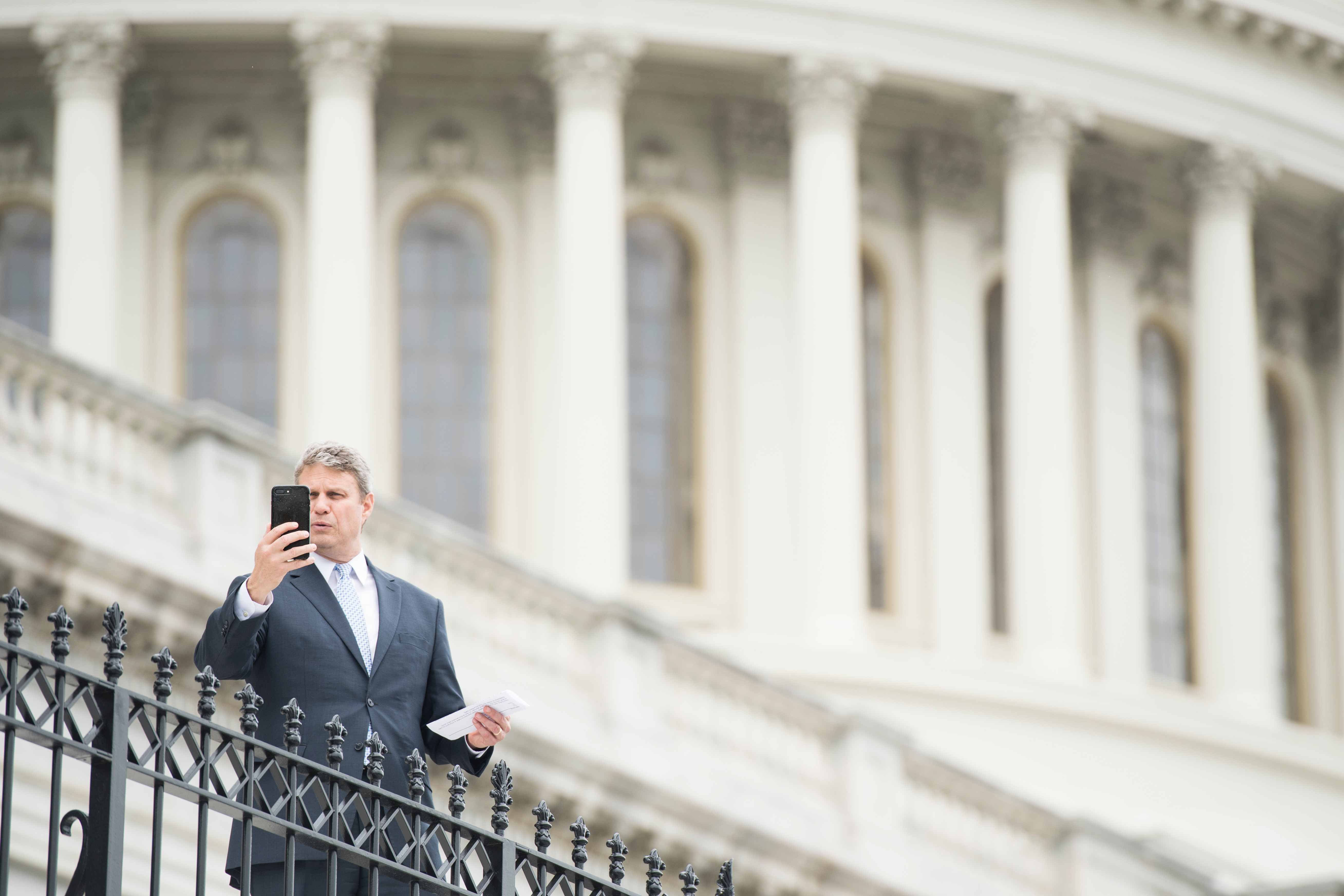 UNITED STATES - MAY 17: Rep. Bill Huizenga, R-Mich., films a selfie video outside of the Capitol in between votes on Friday, May 17, 2019. (Photo By Bill Clark/CQ Roll Call)
