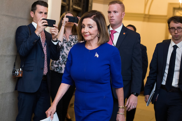 Speaker Nancy Pelosi says she is directly six House committees to proceed with their investigation “under that umbrella of impeachment inquiry.” (Tom Williams/CQ Roll Call)