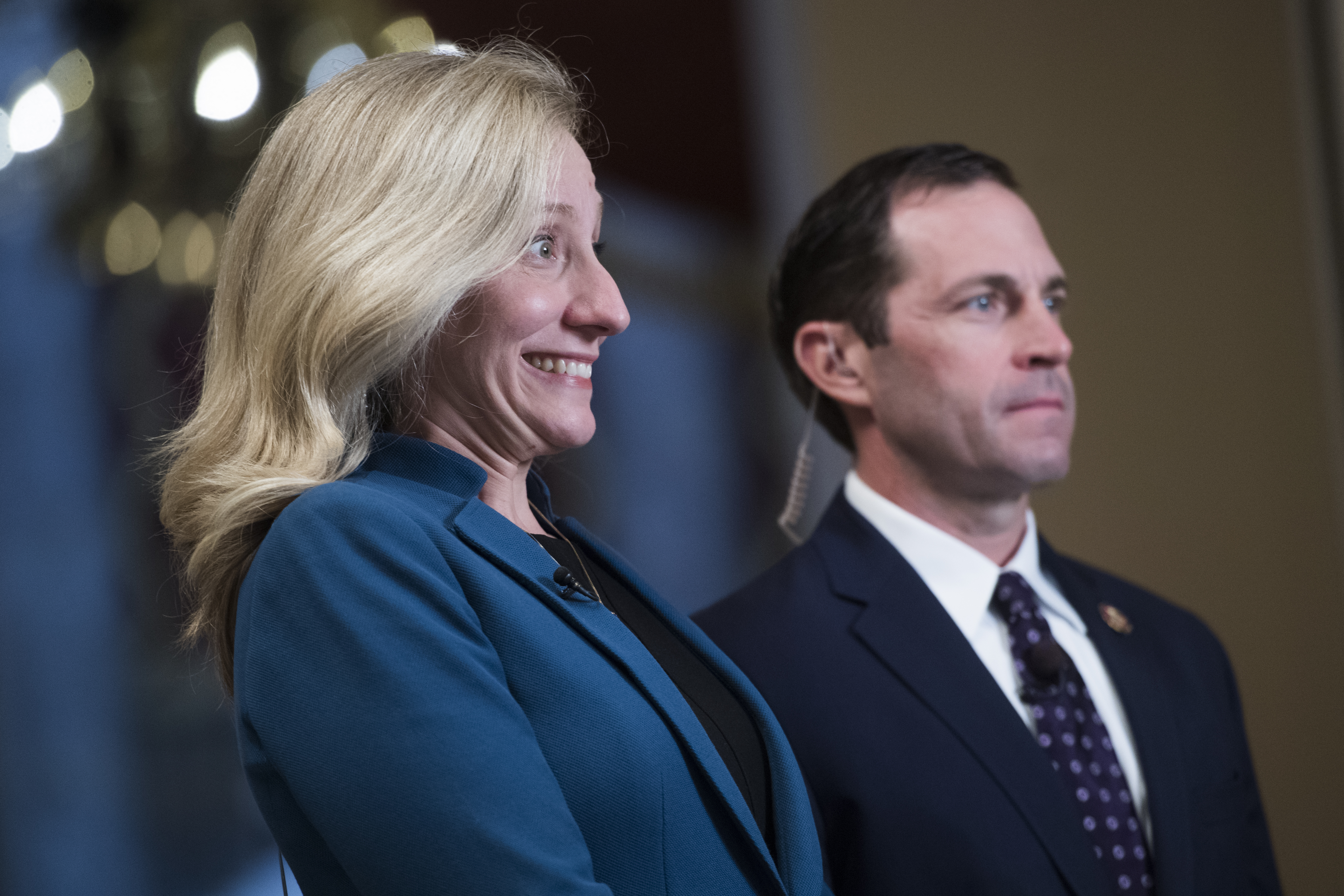 UNITED STATES - SEPTEMBER 24: Reps. Abigail Spanberger, D-Va., and Jason Crow, D-Colo., prepare for a television interview in the Capitol on Tuesday, September 24, 2019. (Photo By Tom William/CQ Roll Call)