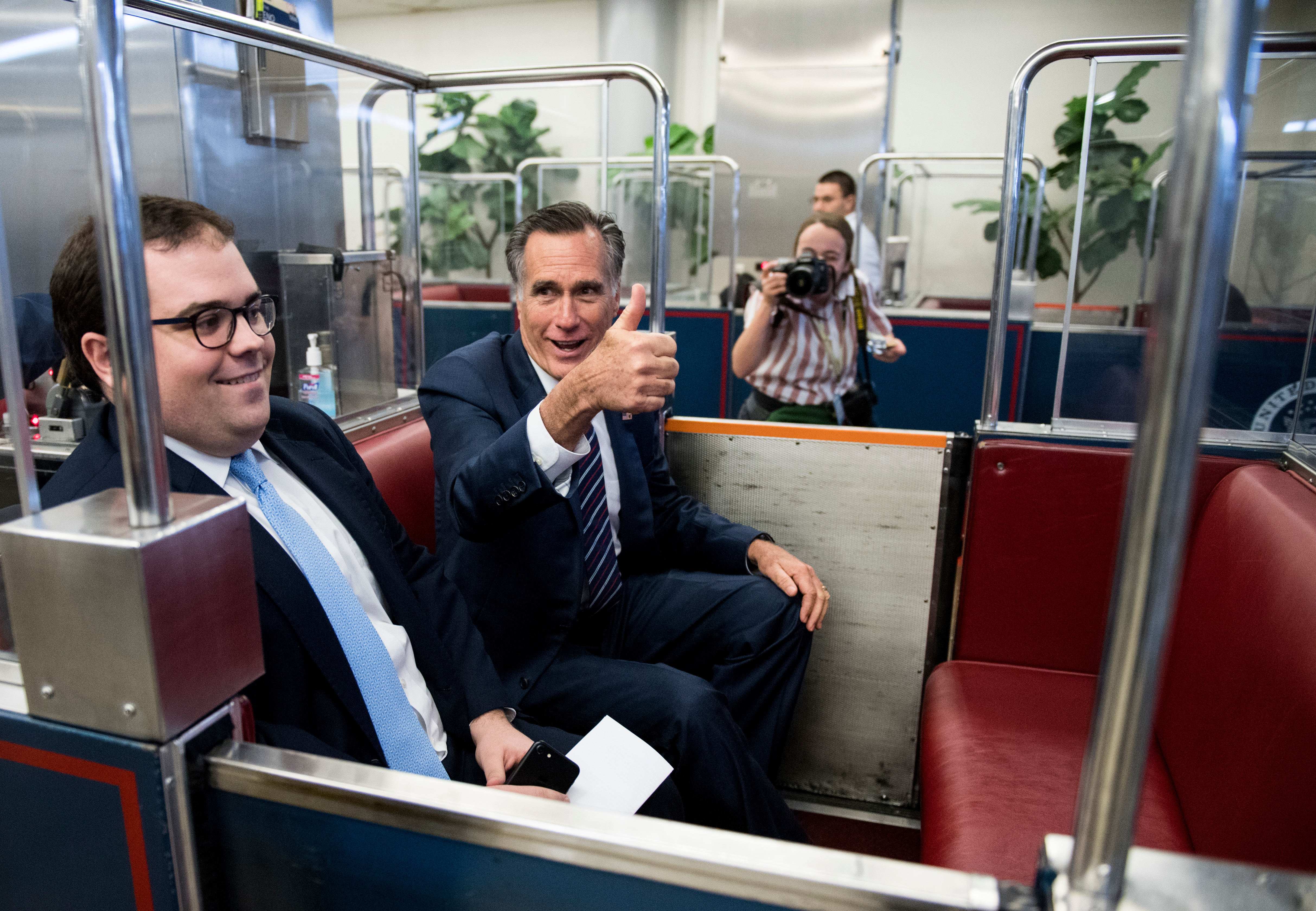 Utah Sen. Mitt Romney, aka Pierre Delecto, takes a ride on the Senate subway in January. (Bill Clark/CQ Roll Call file photo)