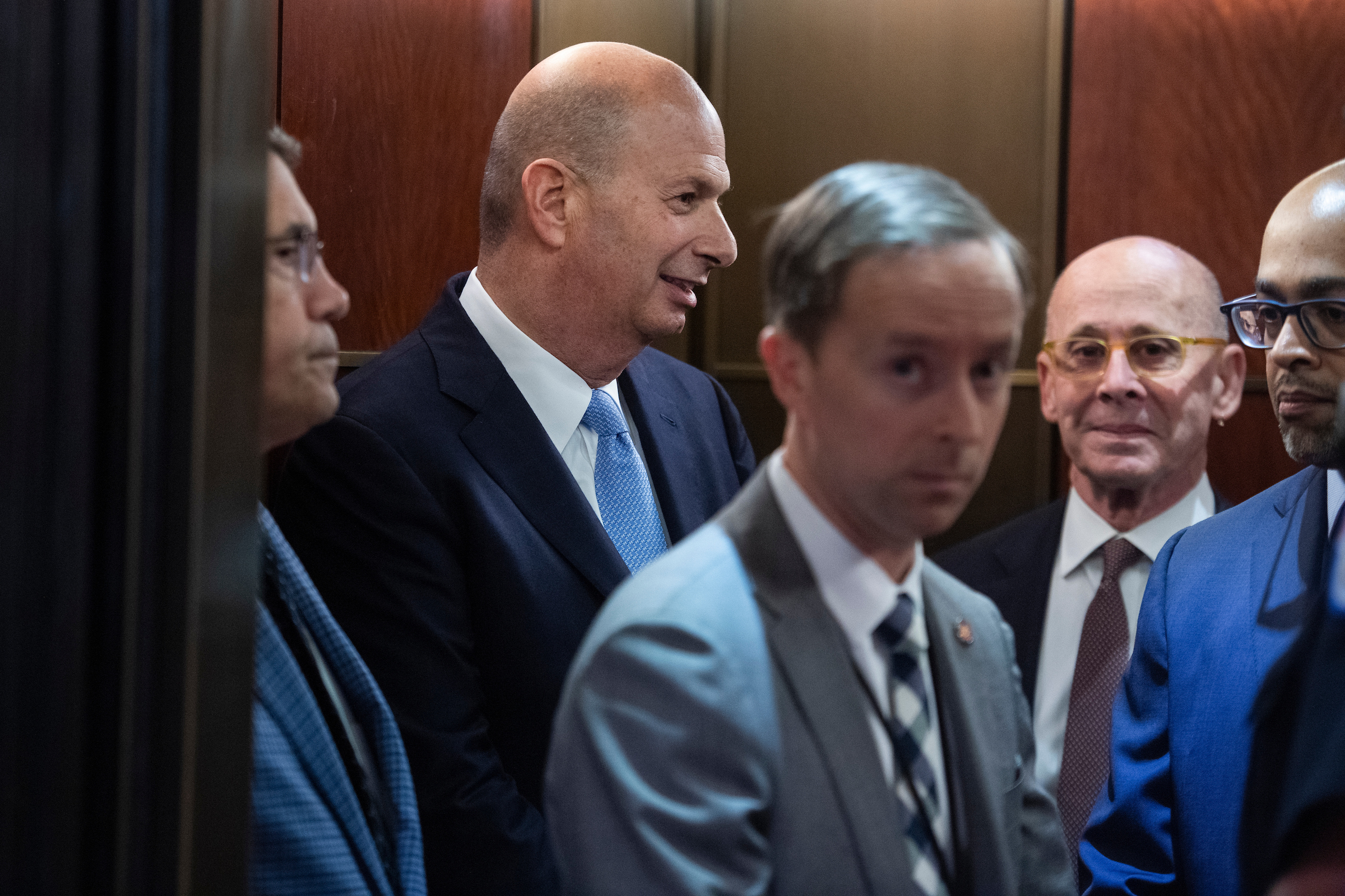 Gordon Sondland, second from left, U.S. ambassador to the European Union, arrives at the Capitol on Thursday for his deposition as part of the House’s impeachment inquiry. (Tom Williams/CQ Roll Call)