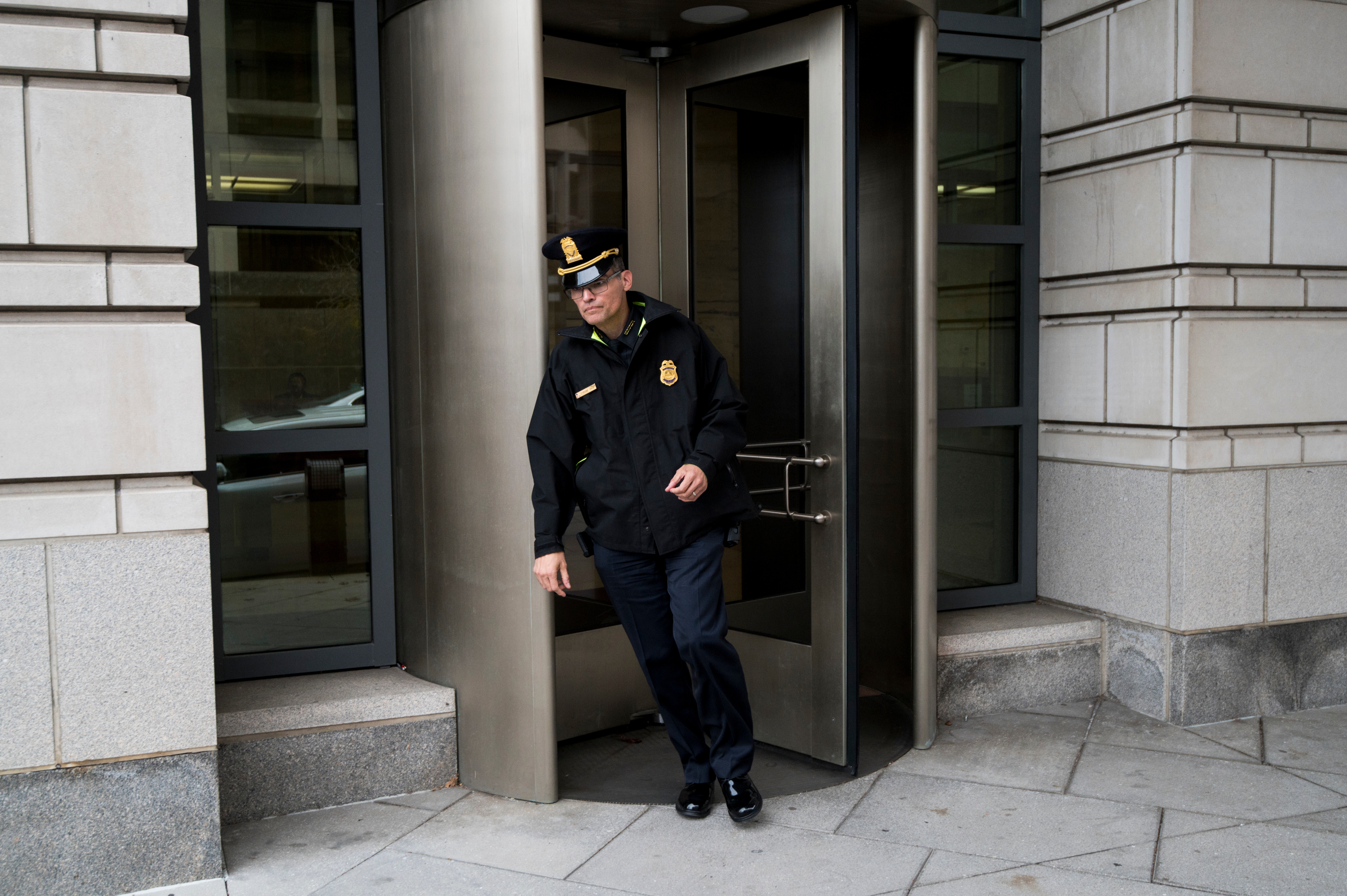UNITED STATES - NOVEMBER 7: Tyrone Vias of the U.S. Capitol Police leaves the E. Barrett Prettyman Federal Courthousel on Thursday Nov. 7, 2019. (Photo By Bill Clark/CQ Roll Call)