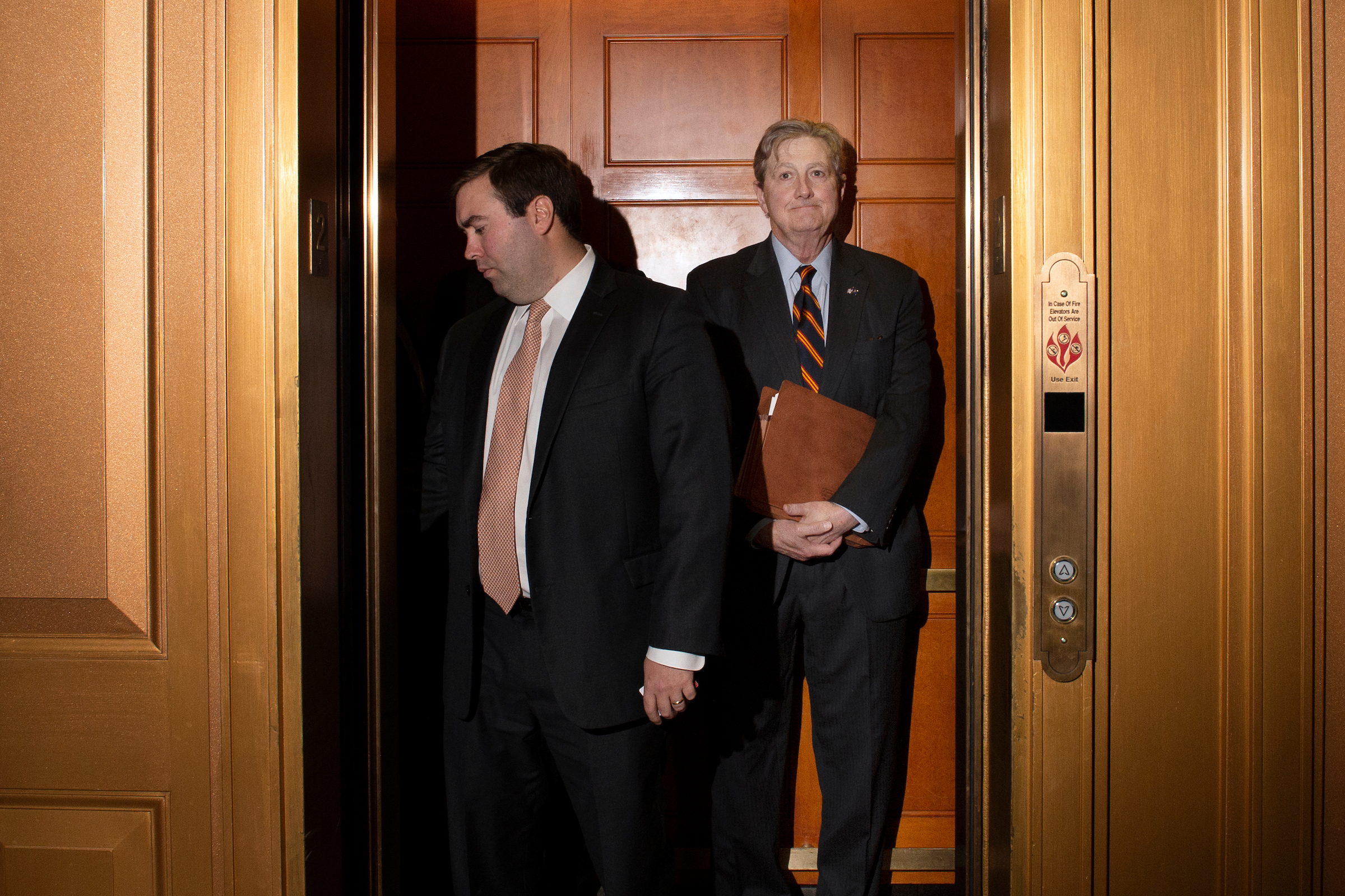 Sen. John Kennedy, R-La., waits in the elevator in the Capitol on Tuesday. (Caroline Brehman/CQ Roll Call)