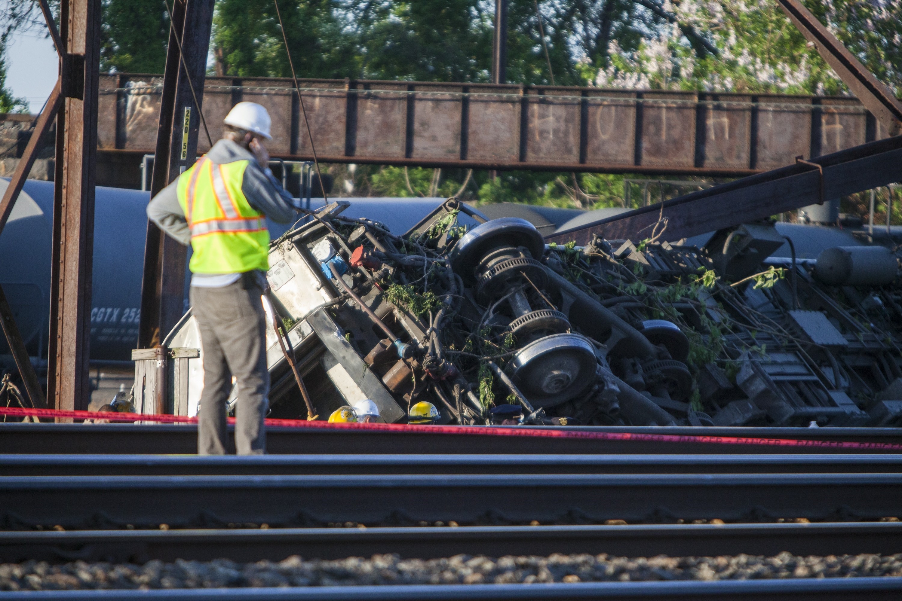 Rescue crews and investigators inspect the site of a May 2015 Amtrak train derailment in Philadelphia . (Photo by Samuel Corum/Anadolu Agency/Getty Images)