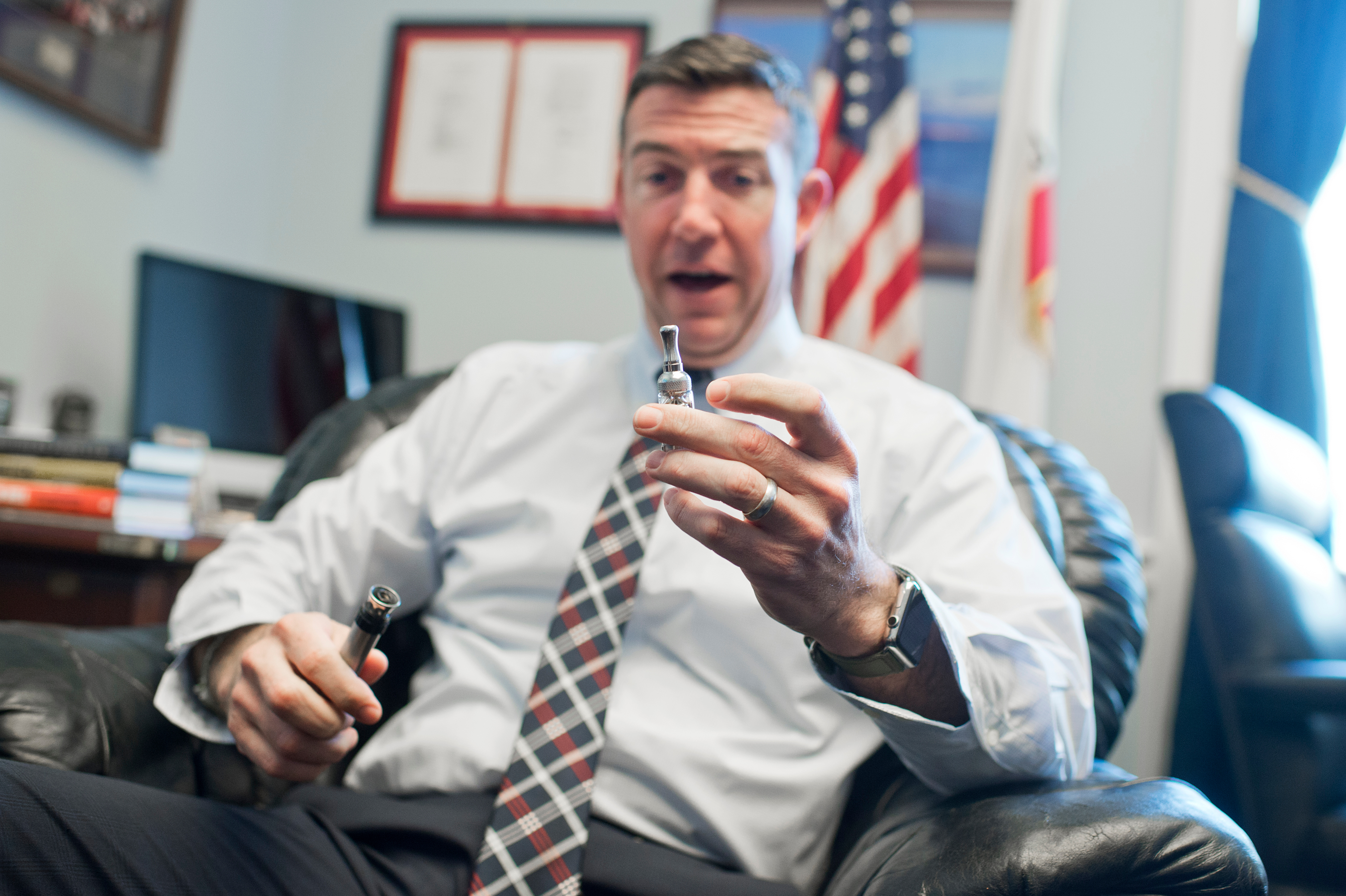 UNITED STATES - JANUARY 13: Rep. Duncan Hunter, R-Calif., is interviewed about his vaporizer pen in his Rayburn office, January 13, 2016. (Photo By Tom Williams/CQ Roll Call)