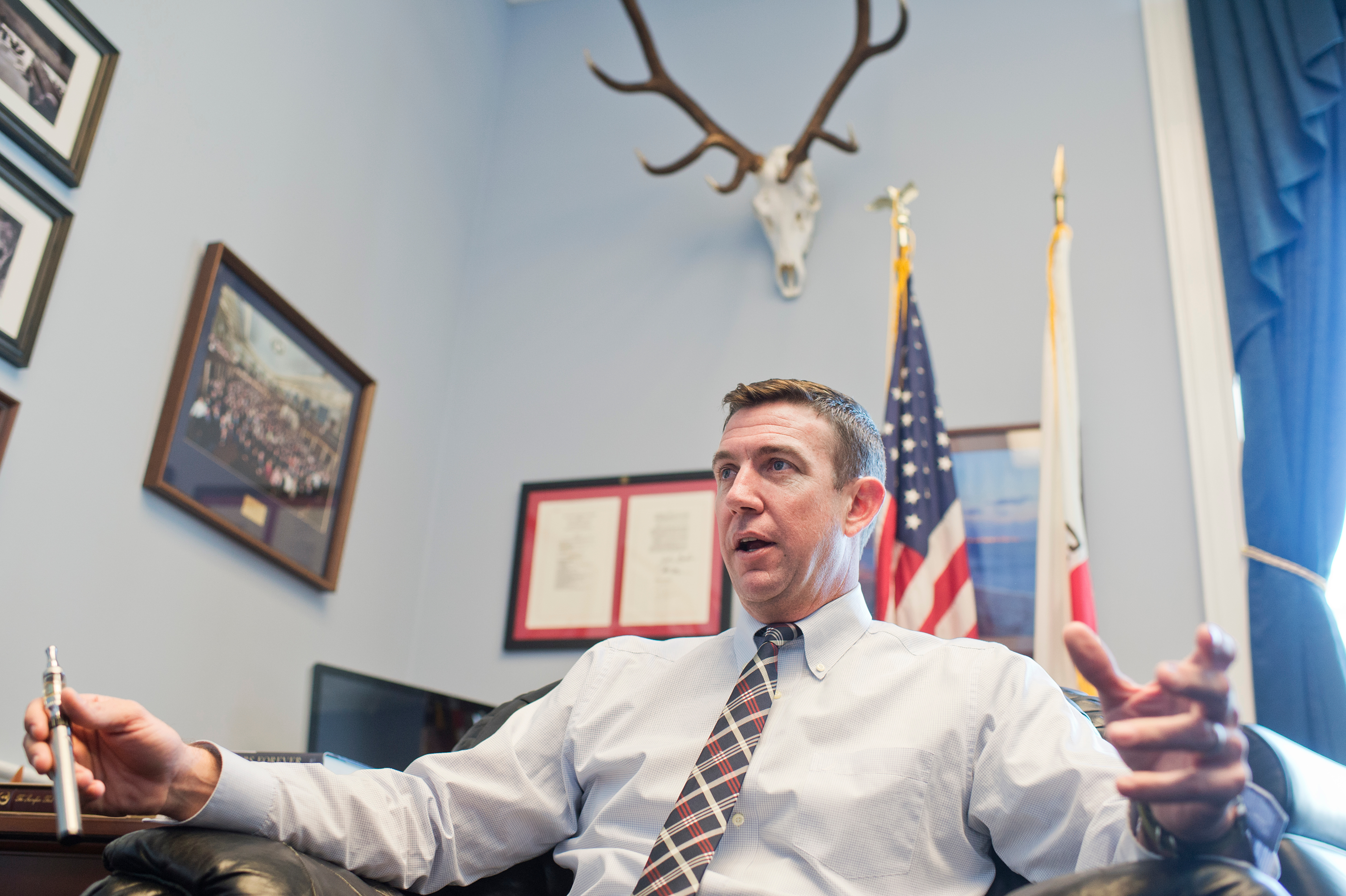 UNITED STATES - JANUARY 13: Rep. Duncan Hunter, R-Calif., is interviewed about his vaporizer pen in his Rayburn office, January 13, 2016. (Photo By Tom Williams/CQ Roll Call)
