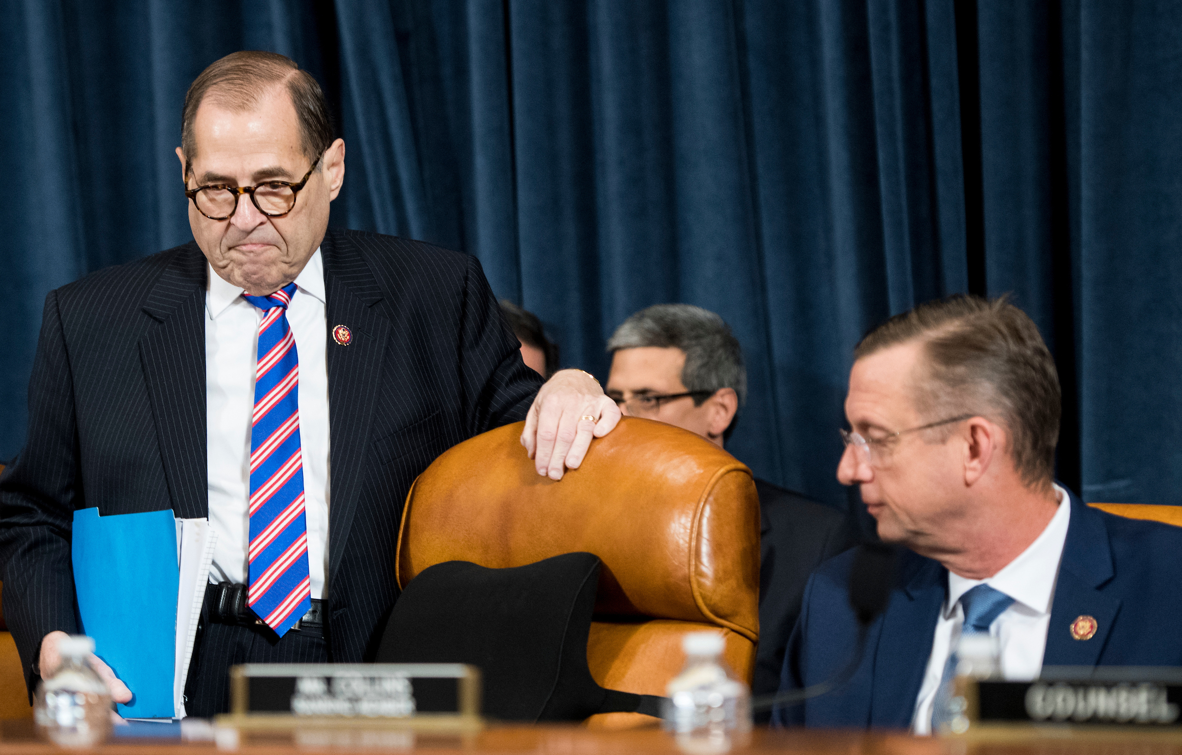 Chairman Jerrold Nadler, D-N.Y., left, takes his seat as ranking member Doug Collins, R-Ga., looks on before the start of the House Judiciary Committee hearing on the impeachment inquiry into President Donald Trump. (Bill Clark/CQ Roll Call)