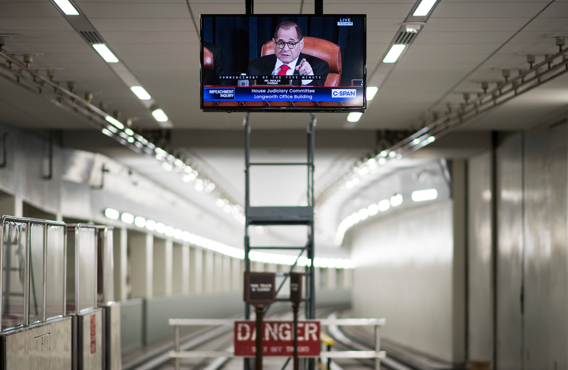 UNITED STATES - DECEMBER 9: Chairman Jerrold Nadler, D-N.Y., appears on a tv monitor in the Rayburn subway as he calls for a recess in the House Judiciary Committee hearing on 