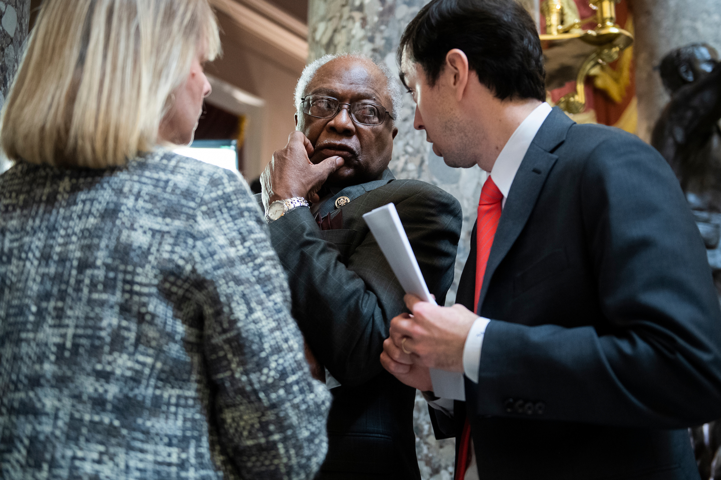 House Majority Whip James Clyburn, D-S.C., is seen in the Capitol’s Statuary Hall during procedural votes on the articles of impeachment against President Donald Trump on Wednesday. (Tom Williams/CQ Roll Call)