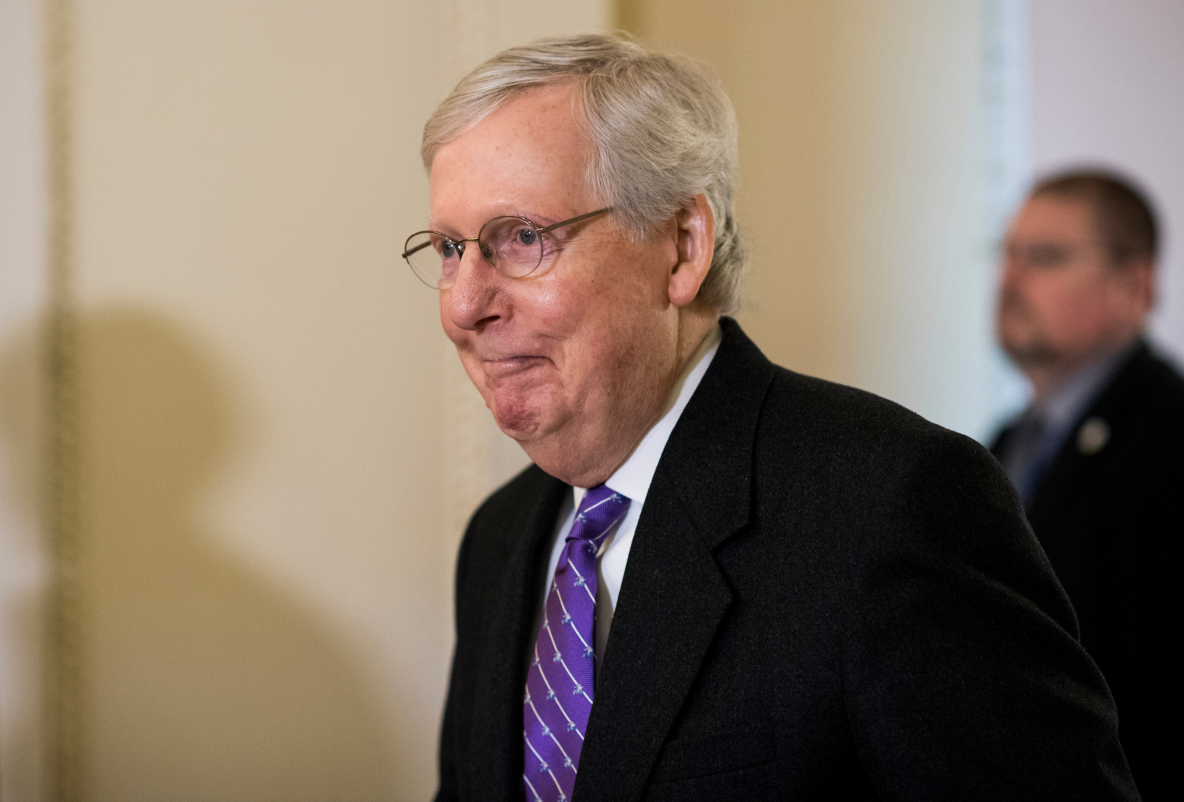 Senate Majority Leader Mitch McConnell, R-Ky., walks to the Senate floor before the start of the Senate impeachment trial proceedings Wednesday. (Bill Clark/CQ Roll Call)