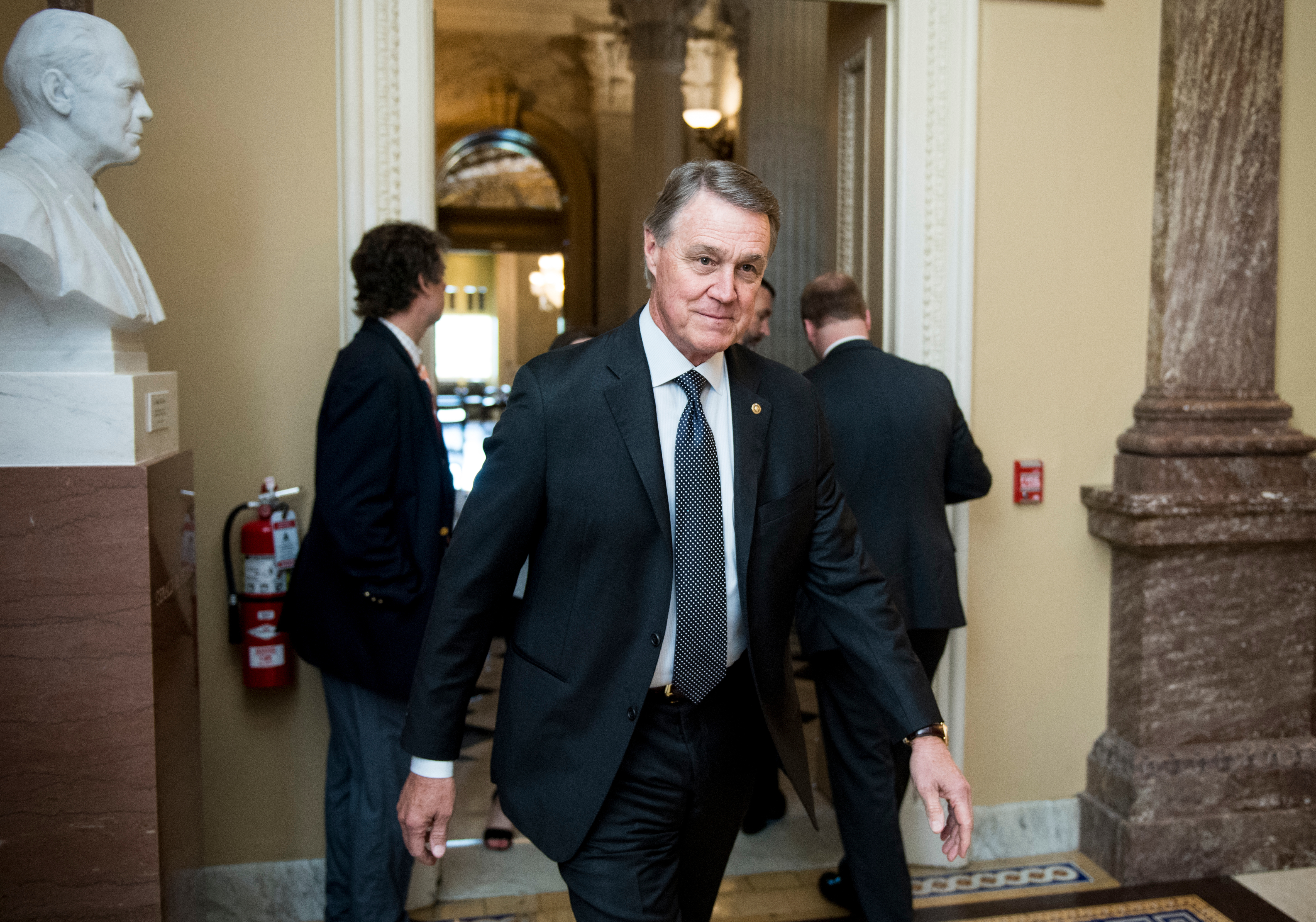 UNITED STATES - MAY 21: Sen. David Perdue, R-Ga., arrives for the Senate Republicans’ policy lunch in the Capitol on Tuesday, May 21, 2019. (Photo By Bill Clark/CQ Roll Call)