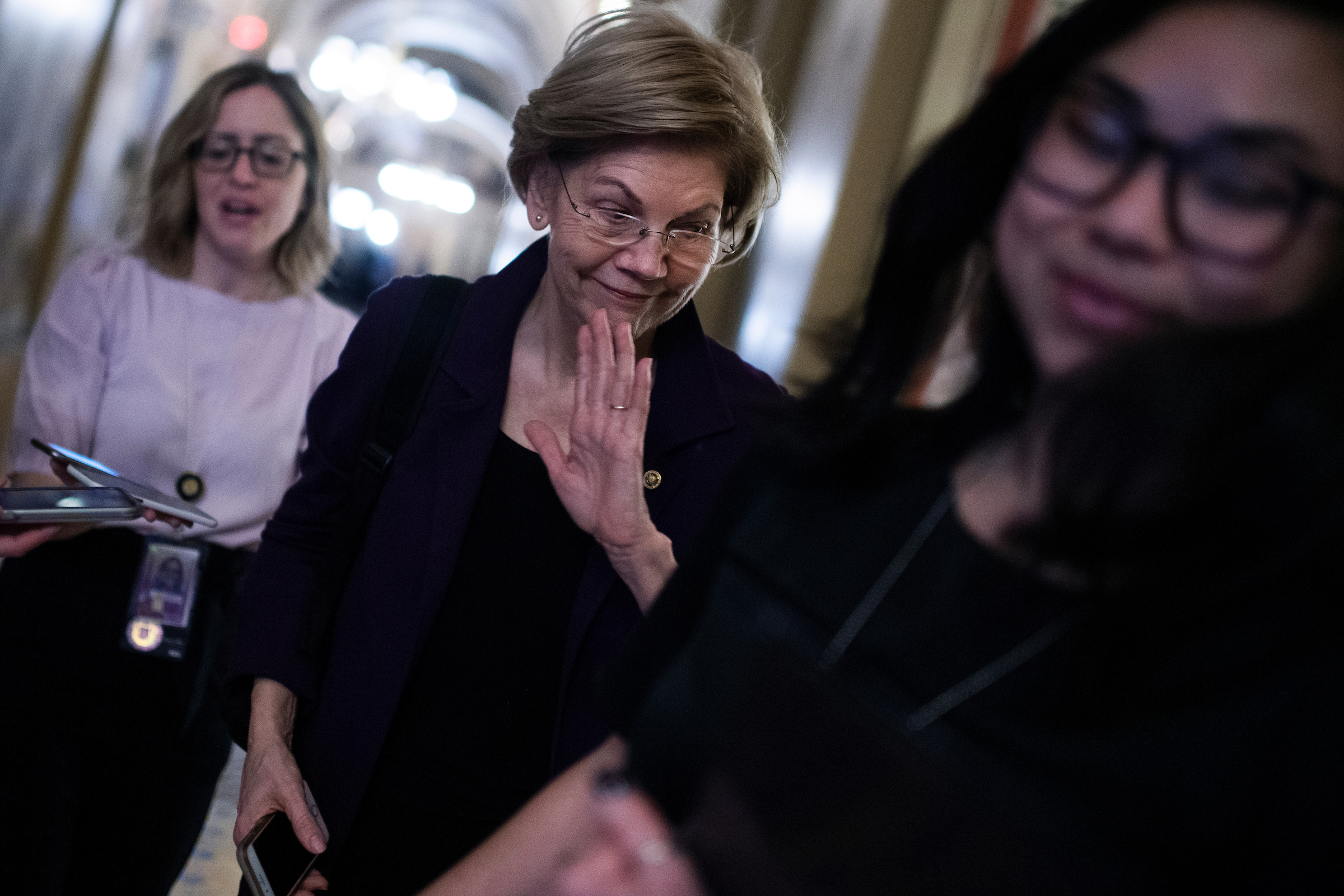 Sen. Elizabeth Warren, a Democratic presidential candidate, arrives at the Capitol on Monday before the continuation of the impeachment trial of President Donald Trump. Warren is expected to leave Washington later Monday for Iowa for the first contest in the Democratic presidential primary. (Tom Williams/CQ Roll Call)